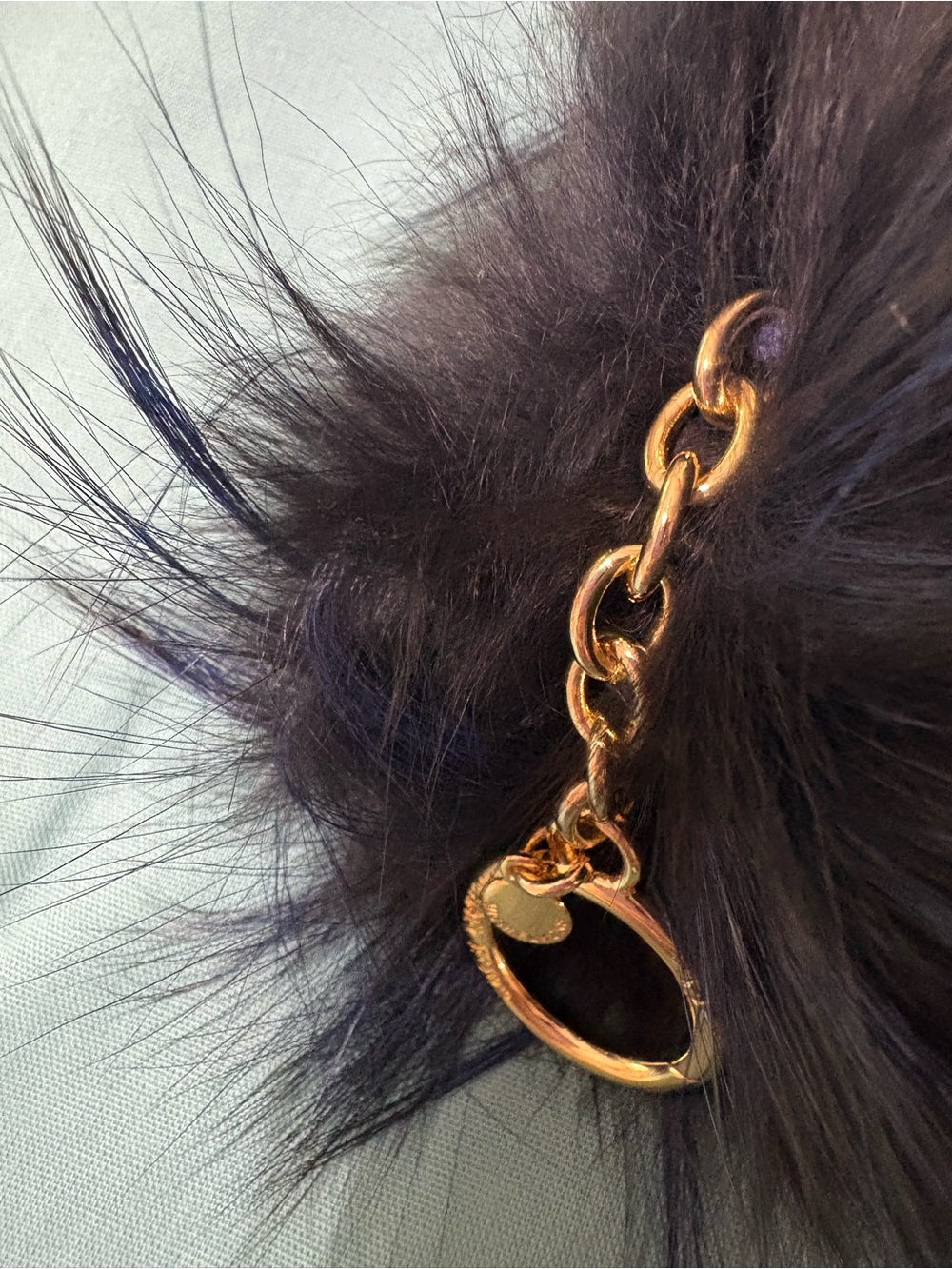 NWOT Michael Kors Fur Pom Keychain in black with navy with Gold Hardware - Picture 3 of 3